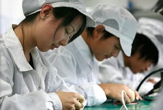Photo Čína: V továrni na iPhone sa pobilo 2000 robotníkov
